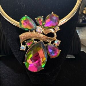 Gorgeous glass watermelon pendant necklace. On torque but chain is possible.